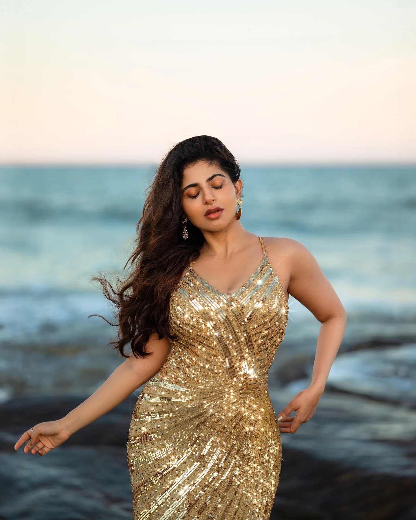 Iswarya Menon Shines like Gold at Beach