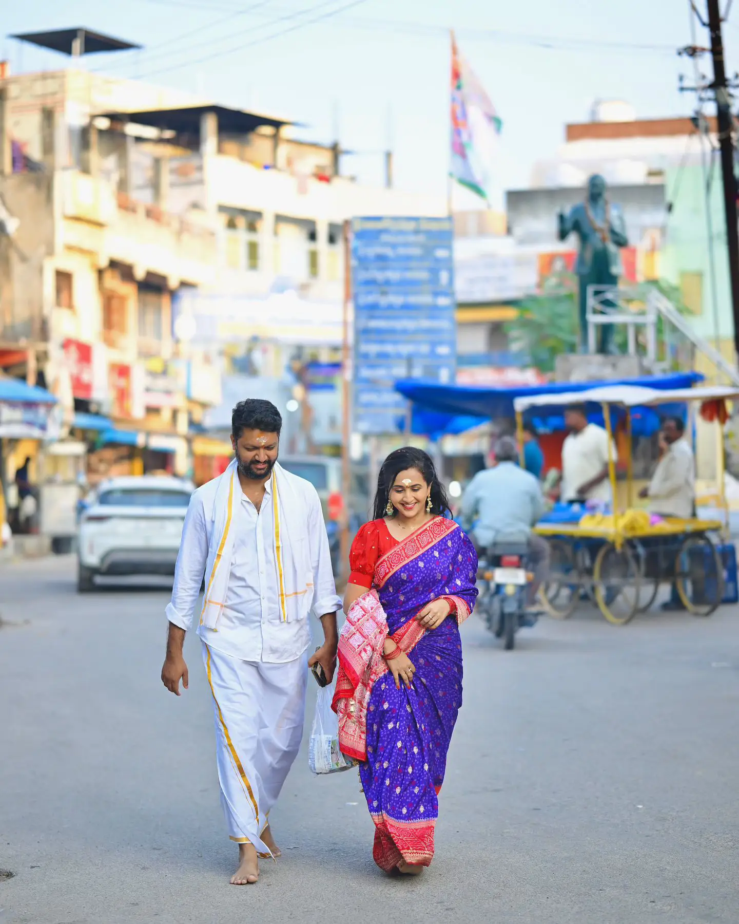 Anchor Lasya Visits Vemulawada Temple with Her Husband Manjunath