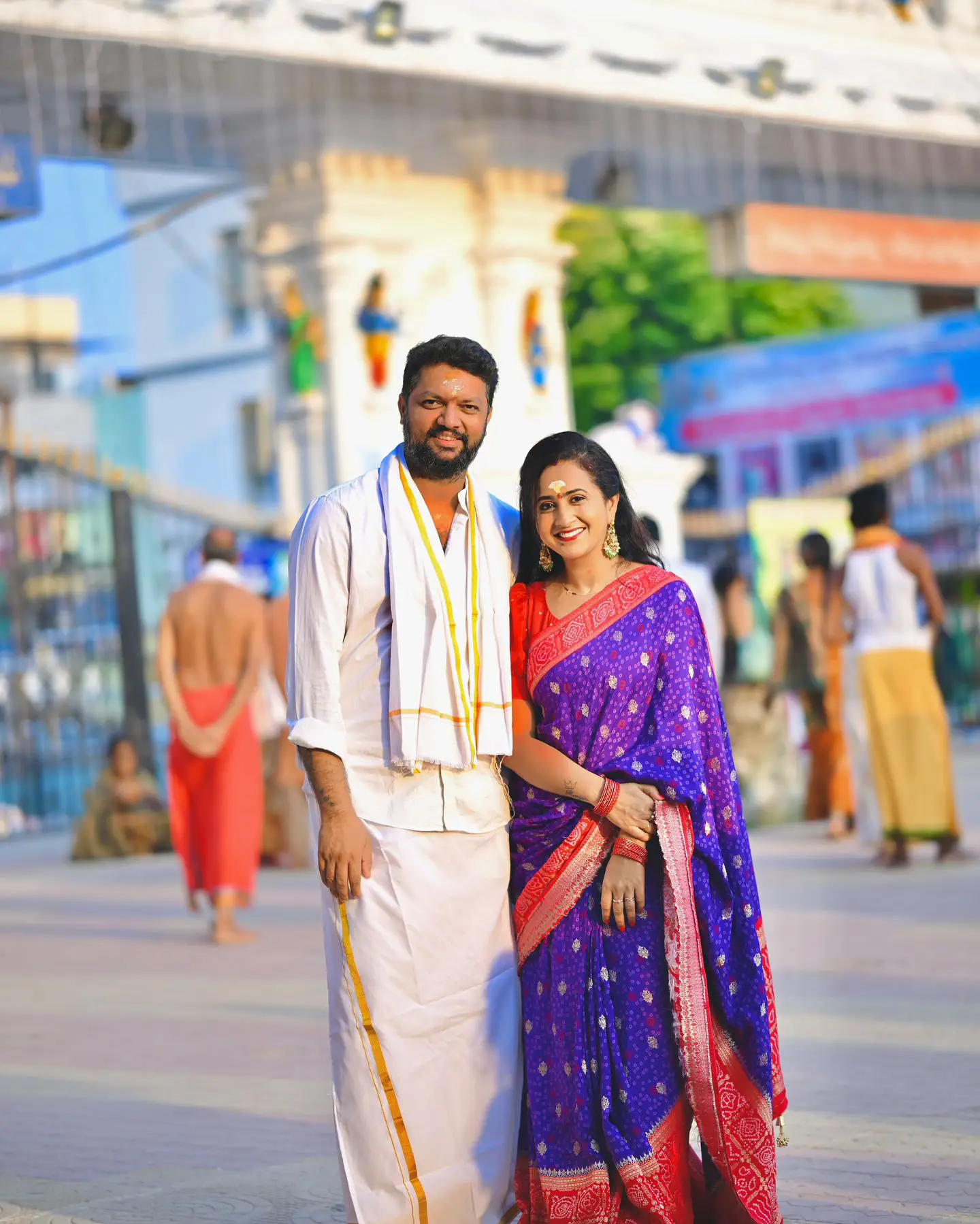 Anchor Lasya Visits Vemulawada Temple with Her Husband Manjunath
