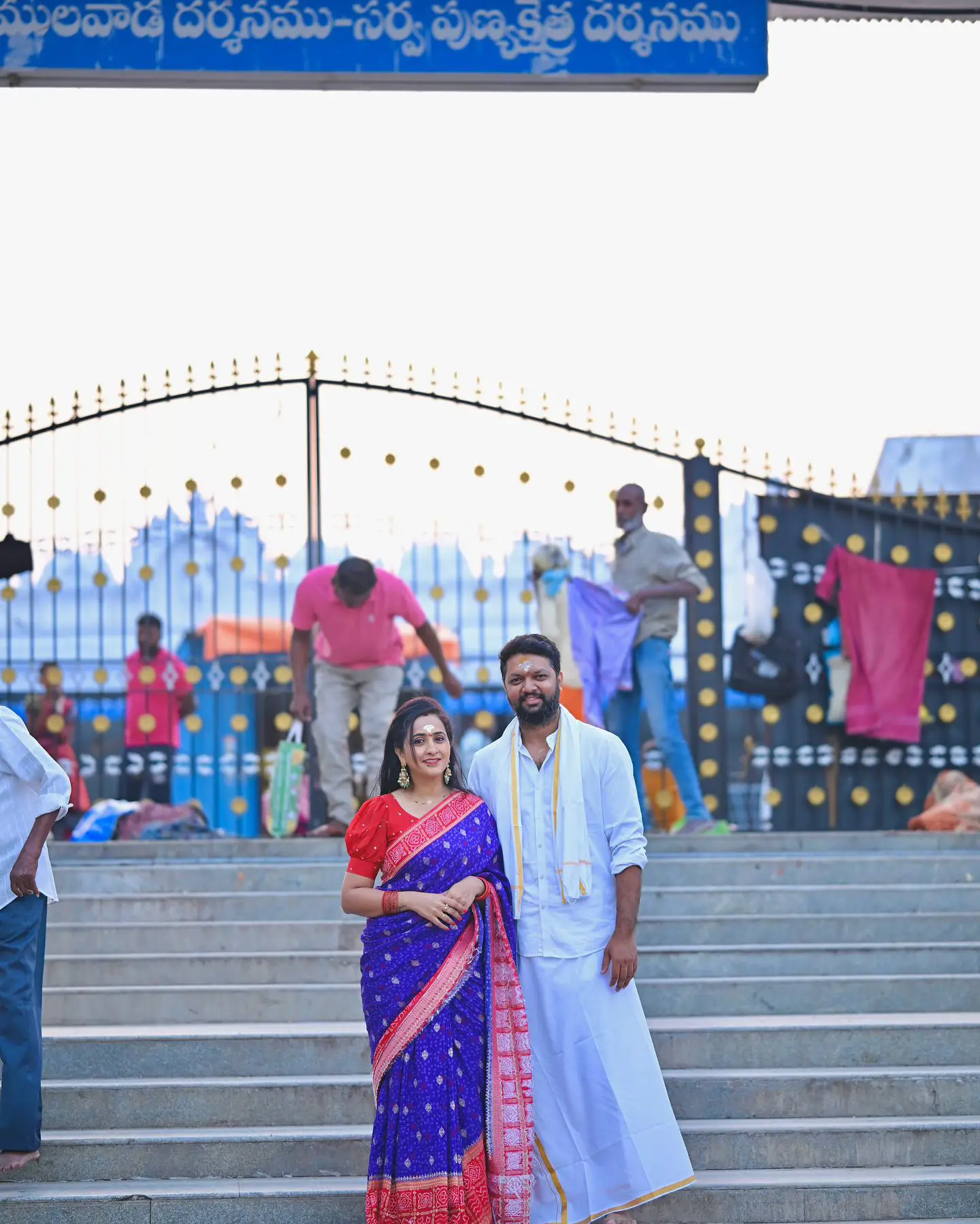Anchor Lasya Visits Vemulawada Temple with Her Husband Manjunath