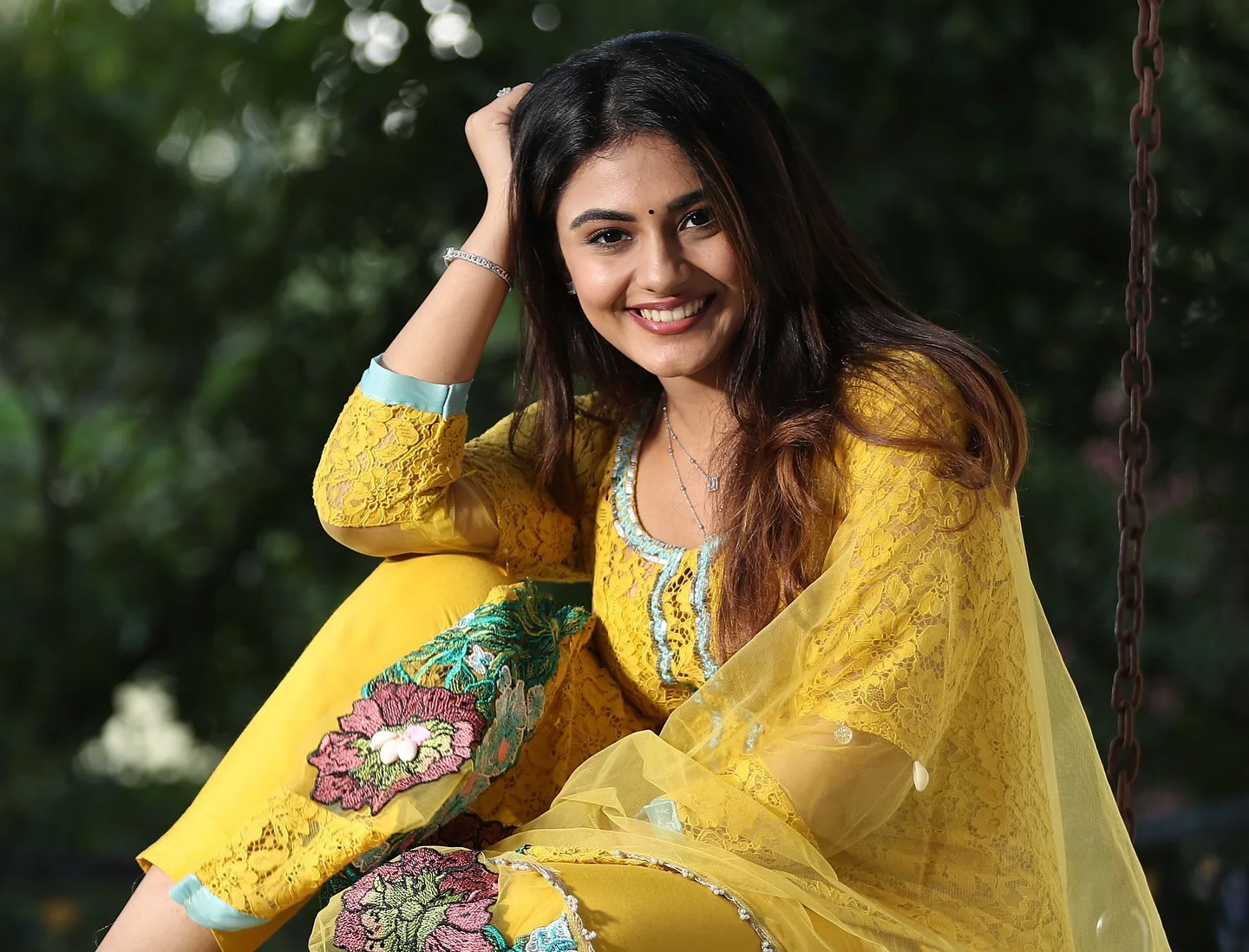 Nayan Sarika Cute Photos on The Cradle