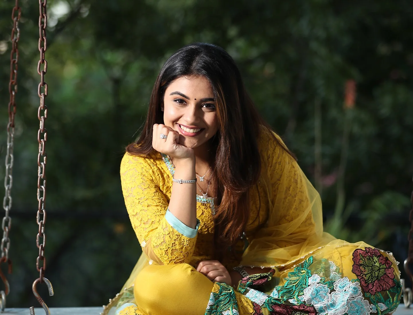Nayan Sarika Cute Photos on The Cradle