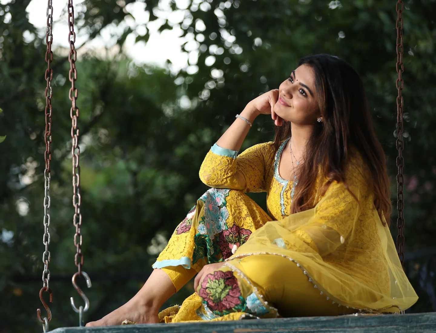 Nayan Sarika Cute Photos on The Cradle