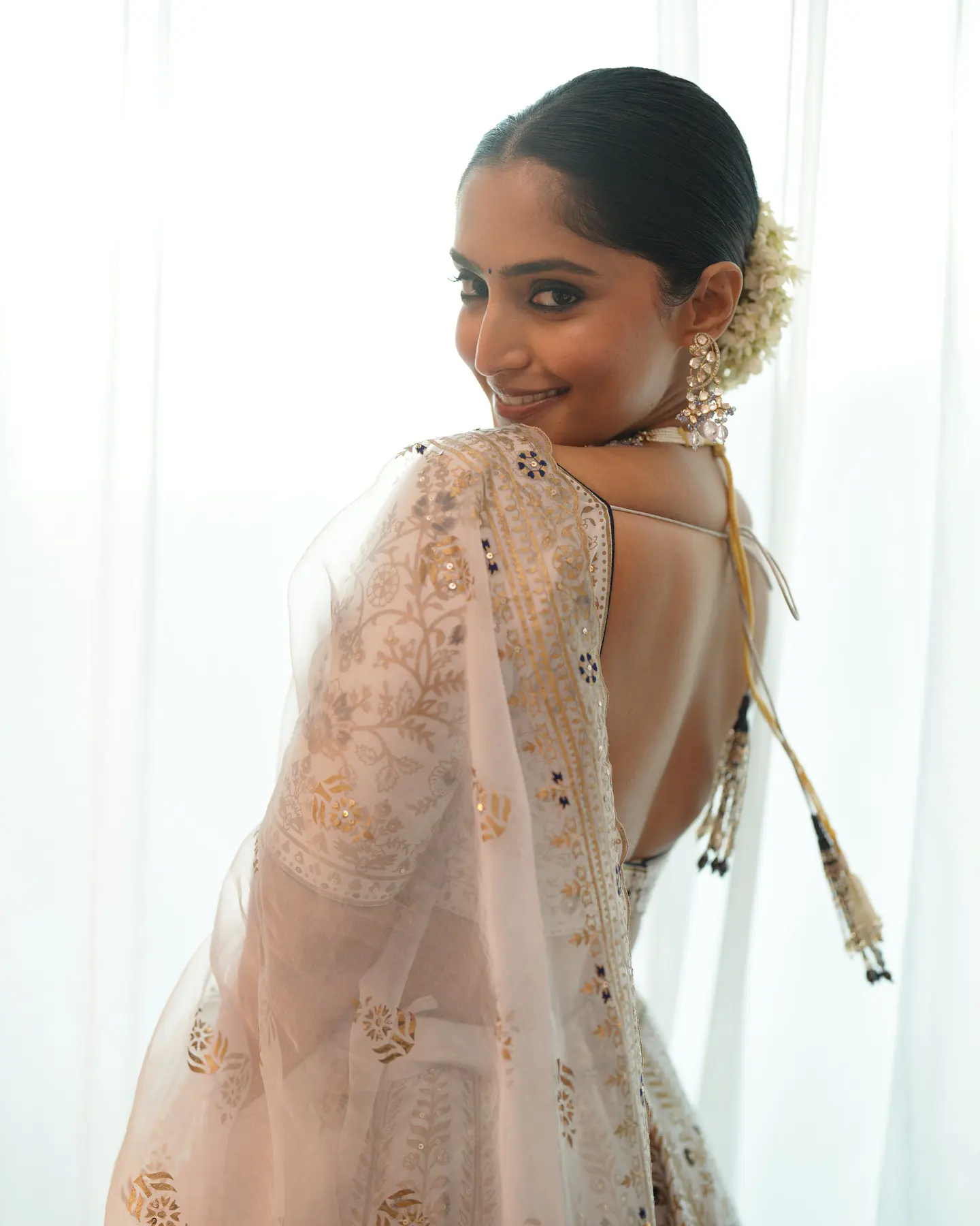 Reba Monica John Shines in Traditional Dress