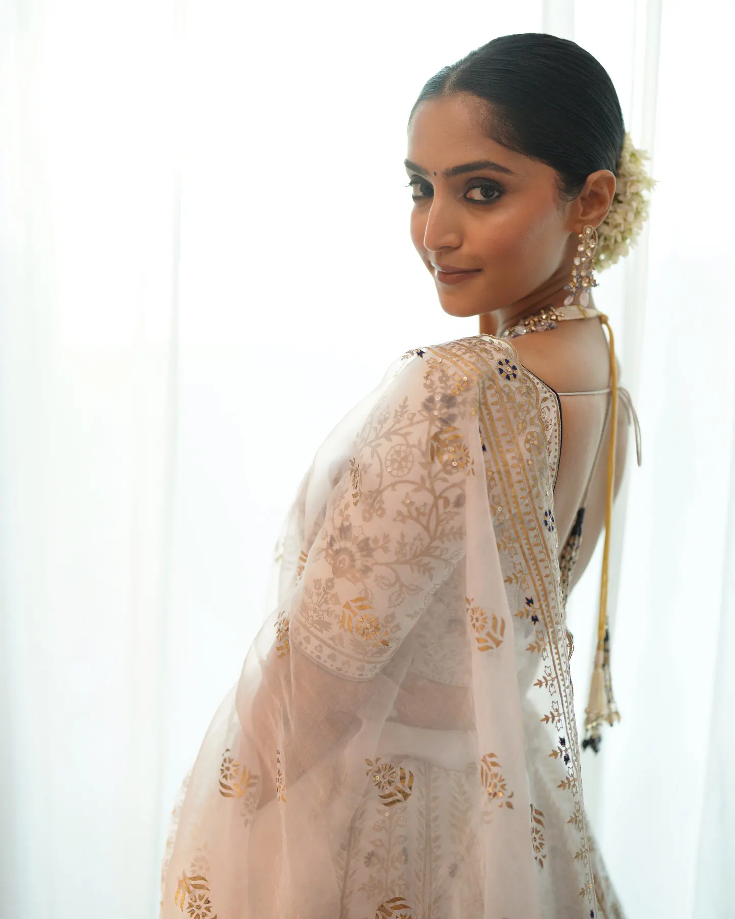 Reba Monica John Shines in Traditional Dress