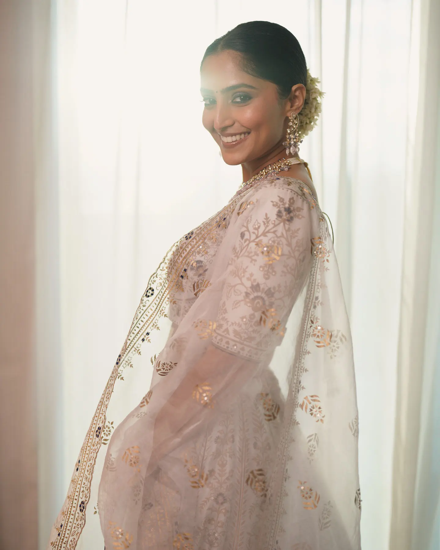 Reba Monica John Shines in Traditional Dress
