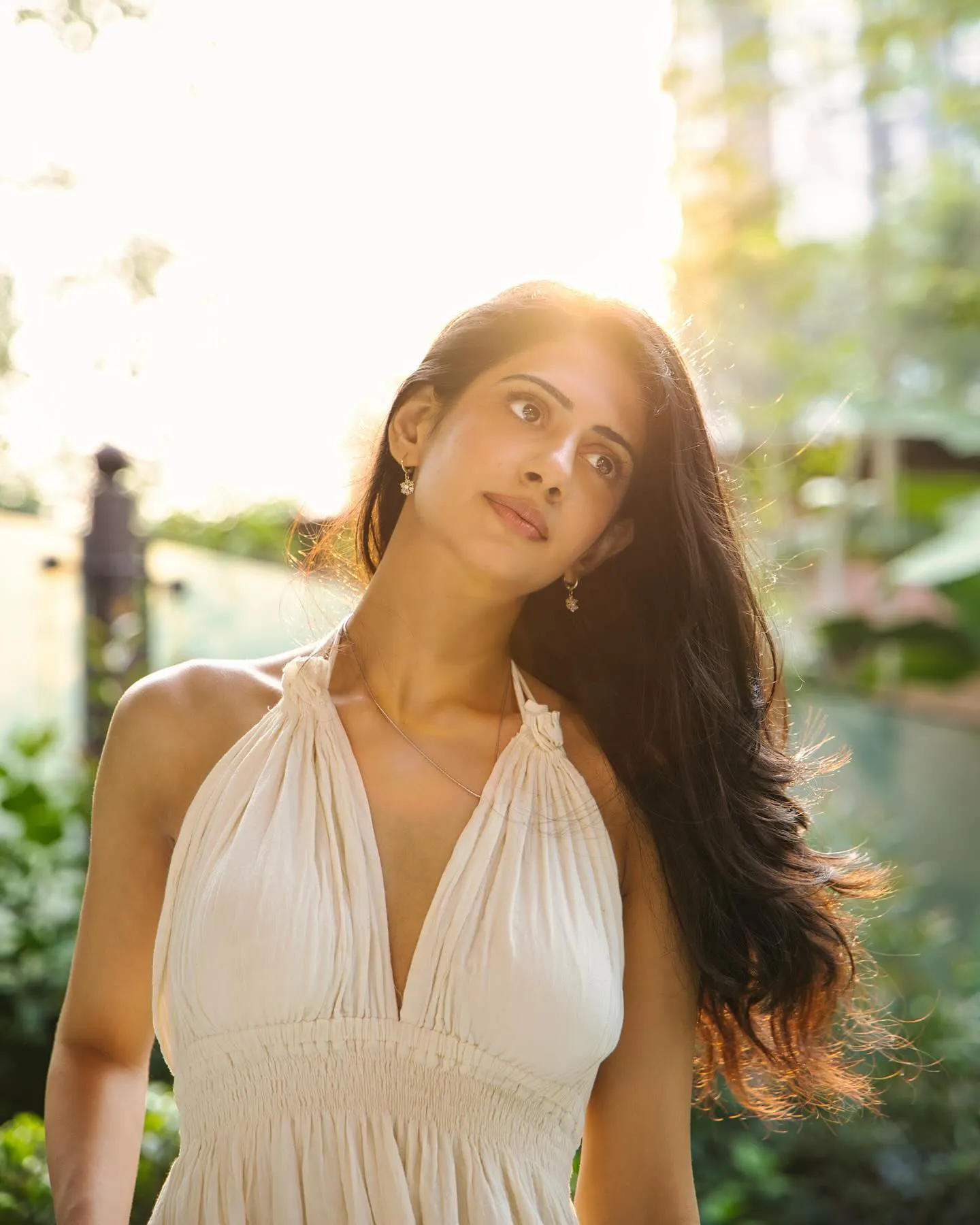Gehna Sippy Shines in White Dress under Sun Light