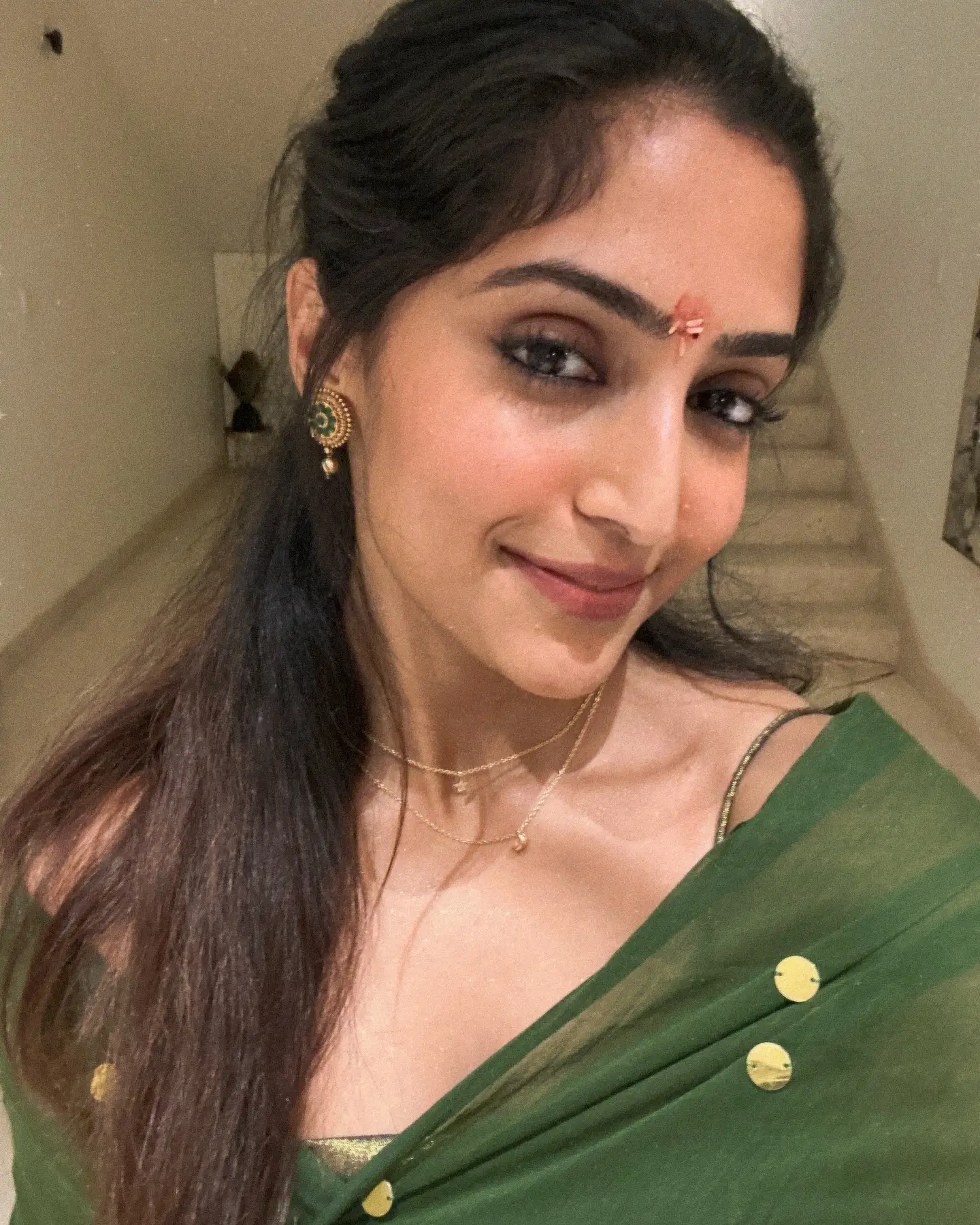 Reba Monica John Cute Photos in Saree