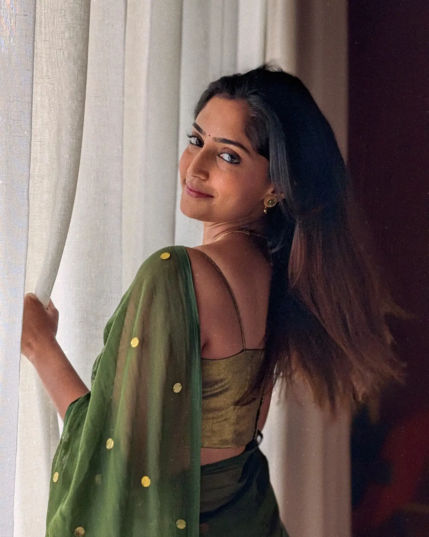 Reba Monica John Cute Photos in Saree