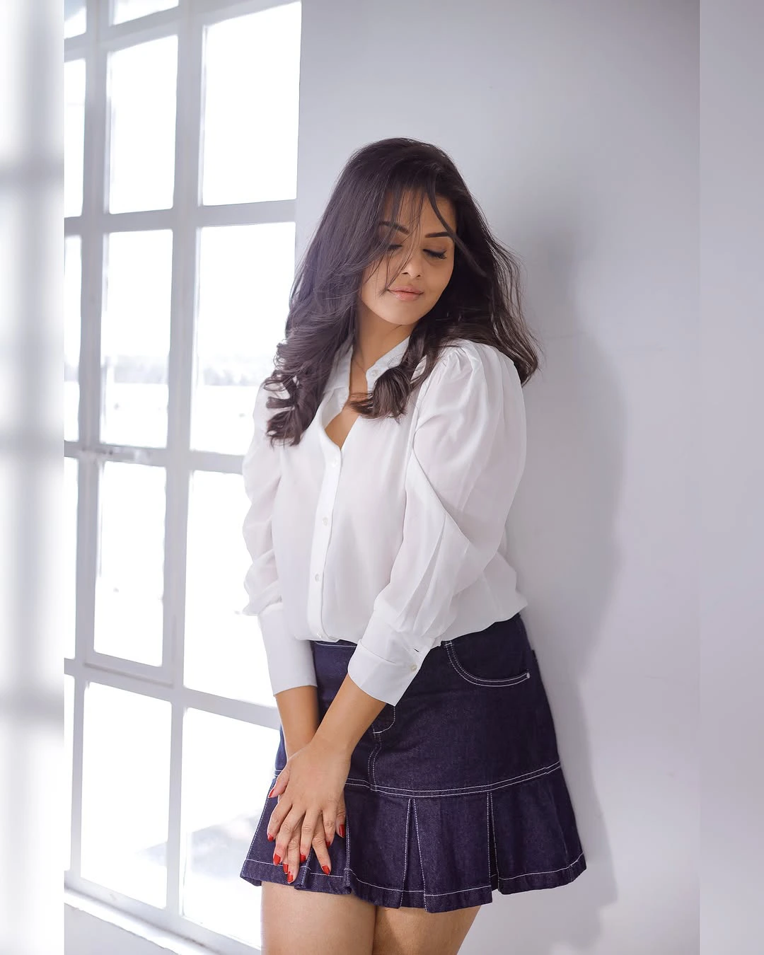 Swathishta Krishnan Cute Photos in Short Skirt