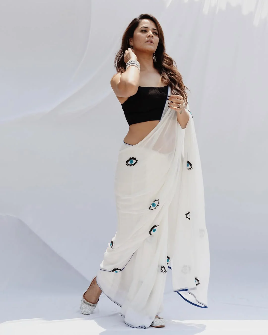 Anasuya Bharadwaj Holi Special Photos in White Saree