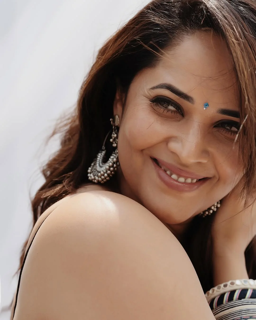 Anasuya Bharadwaj Holi Special Photos in White Saree