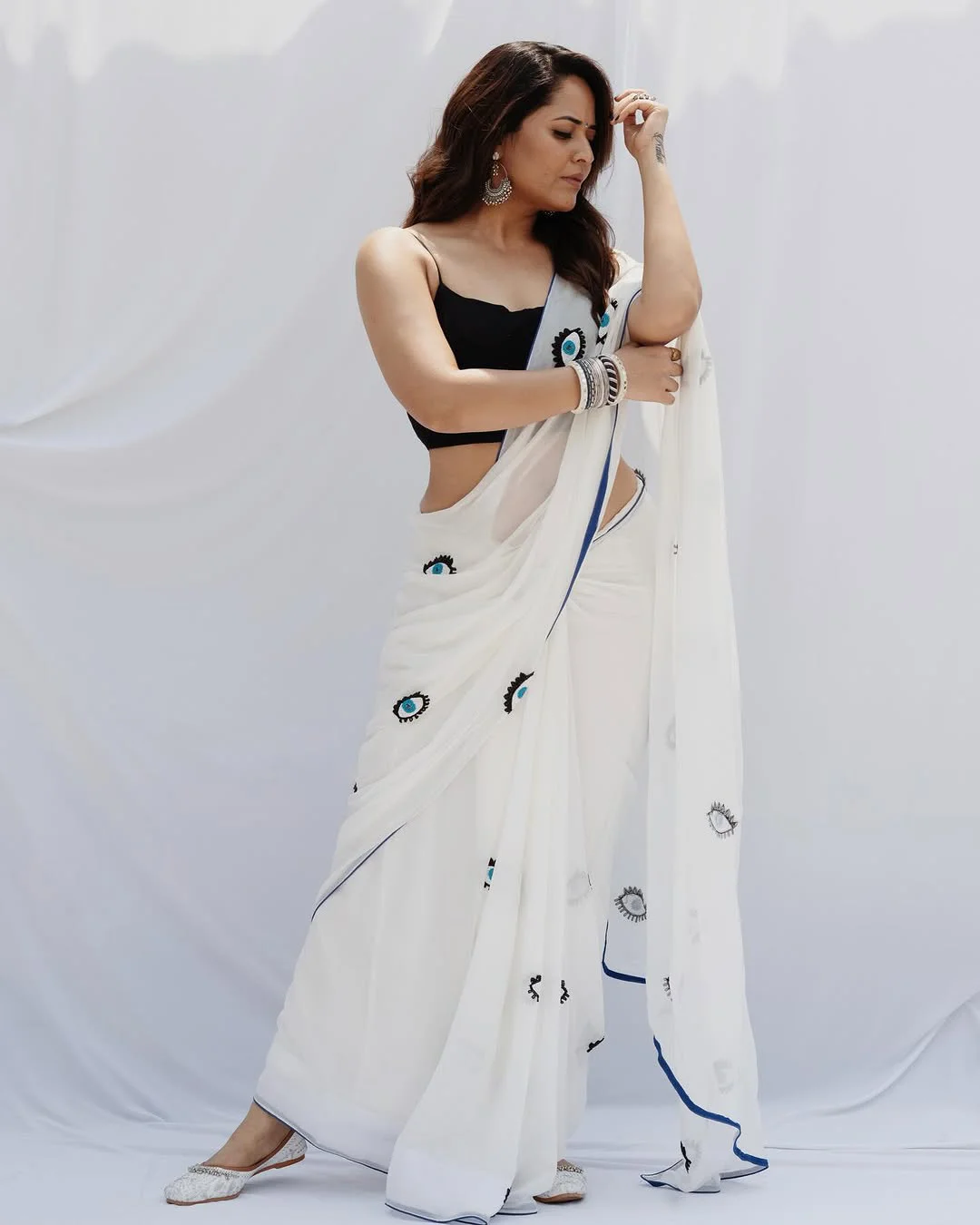 Anasuya Bharadwaj Holi Special Photos in White Saree