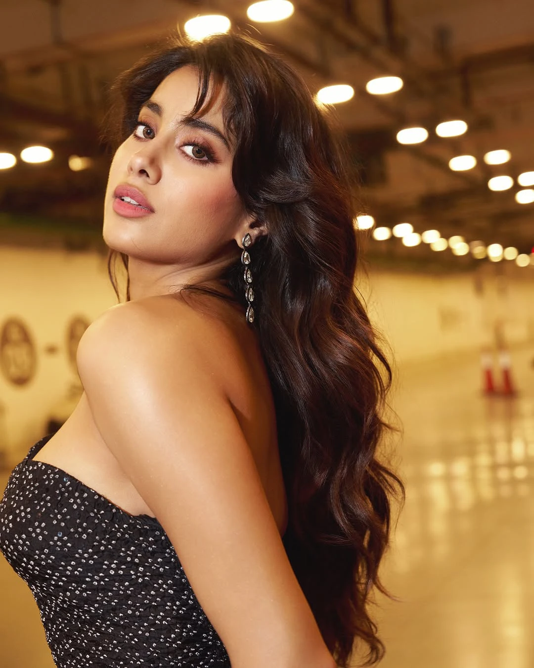 Janhvi Kapoor Sizzling Poses in Black Dress