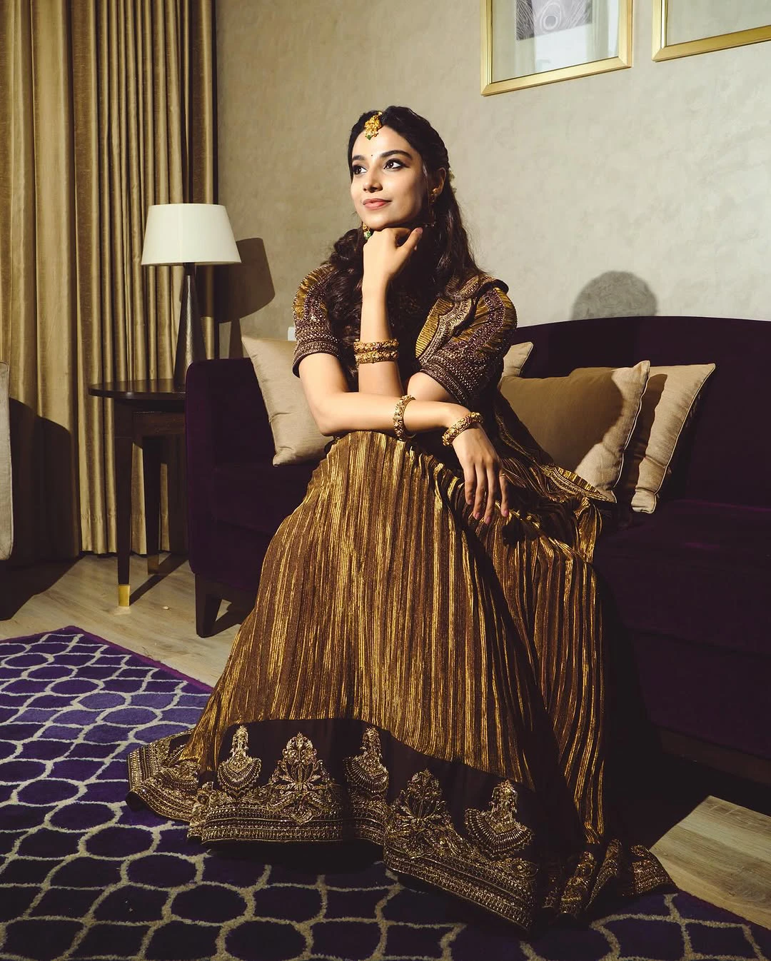 Meenaakshi Chaudhary Cute Photos in Half Saree