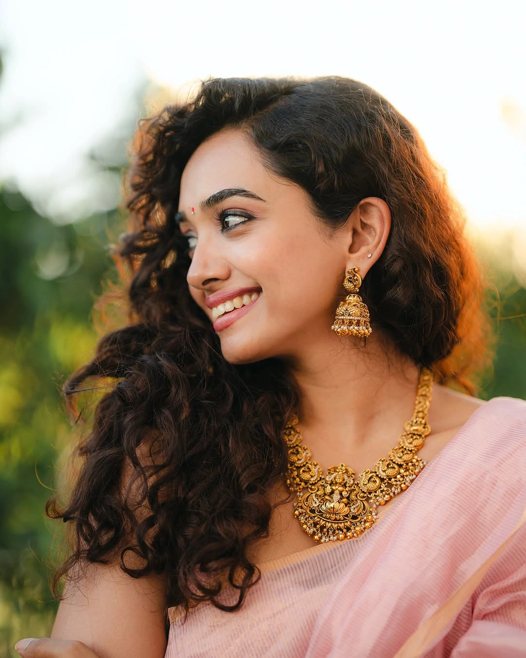Saanve Megghana Cute Photos in Saree