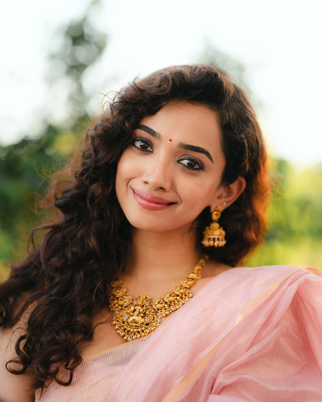 Saanve Megghana Cute Photos in Saree