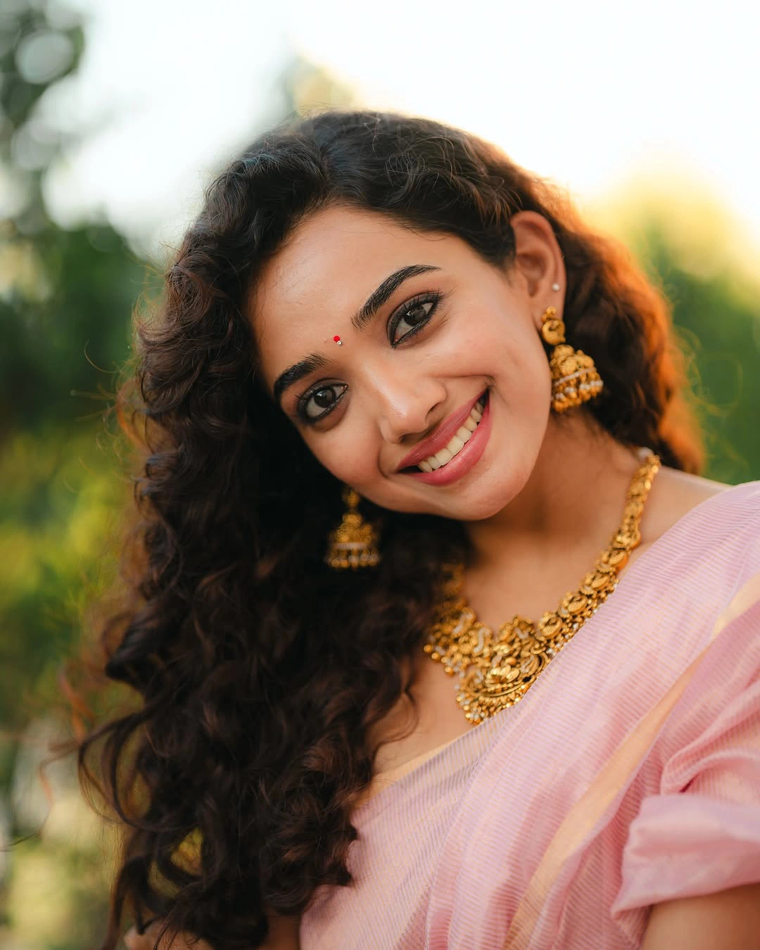 Saanve Megghana Cute Photos in Saree