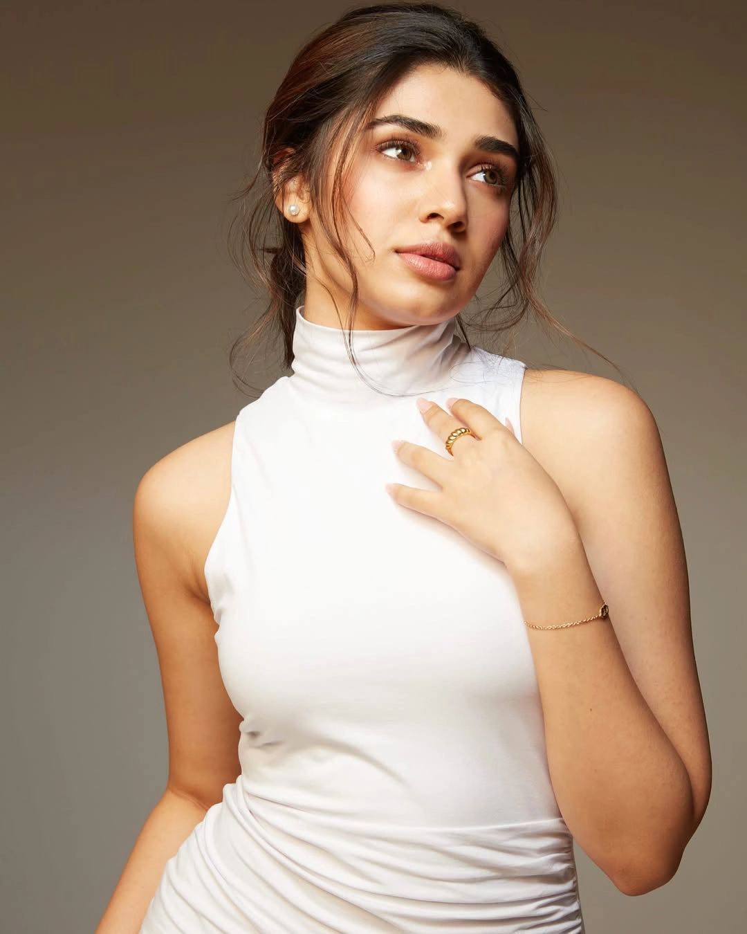 Krithi Shetty Shines in White Dress