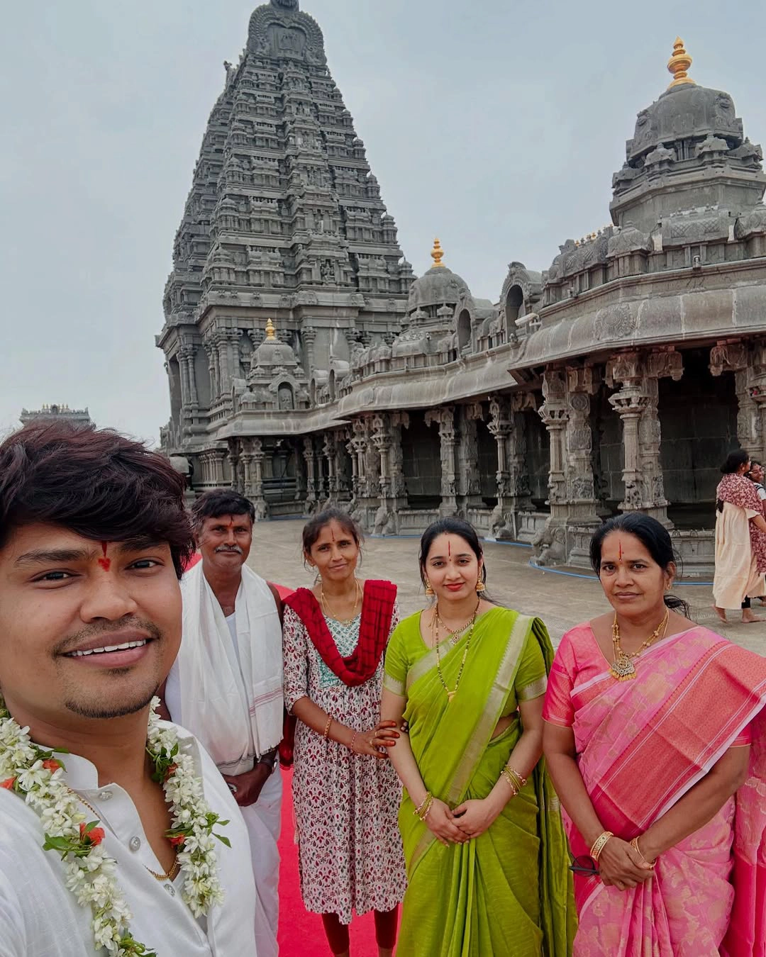 Jabardasth Kevvu Kartheek With Wife Visits Temple