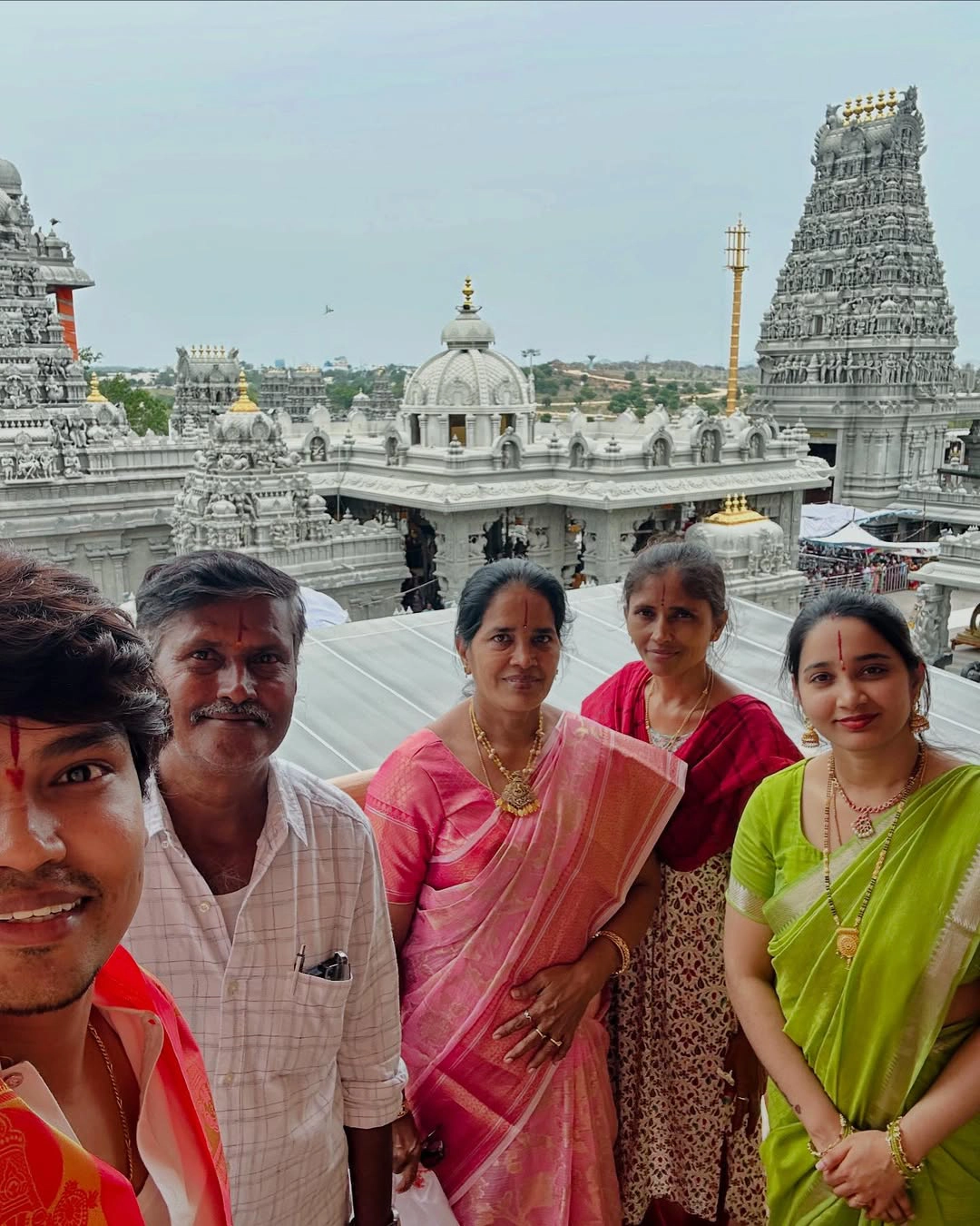 Jabardasth Kevvu Kartheek With Wife Visits Temple