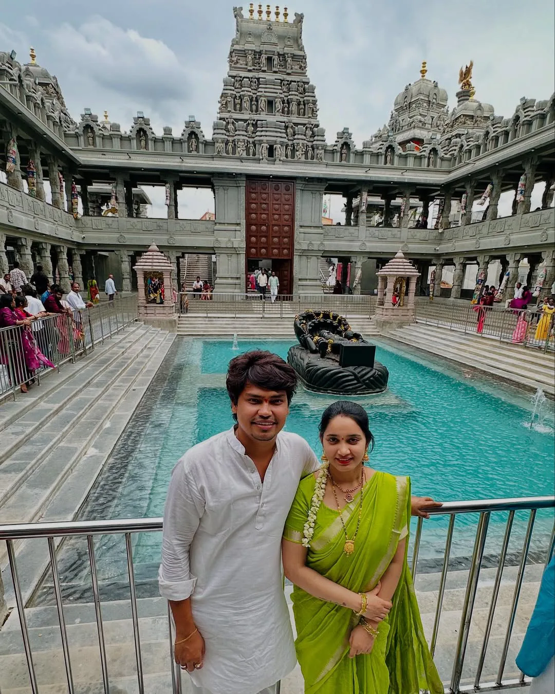Jabardasth Kevvu Kartheek With Wife Visits Temple