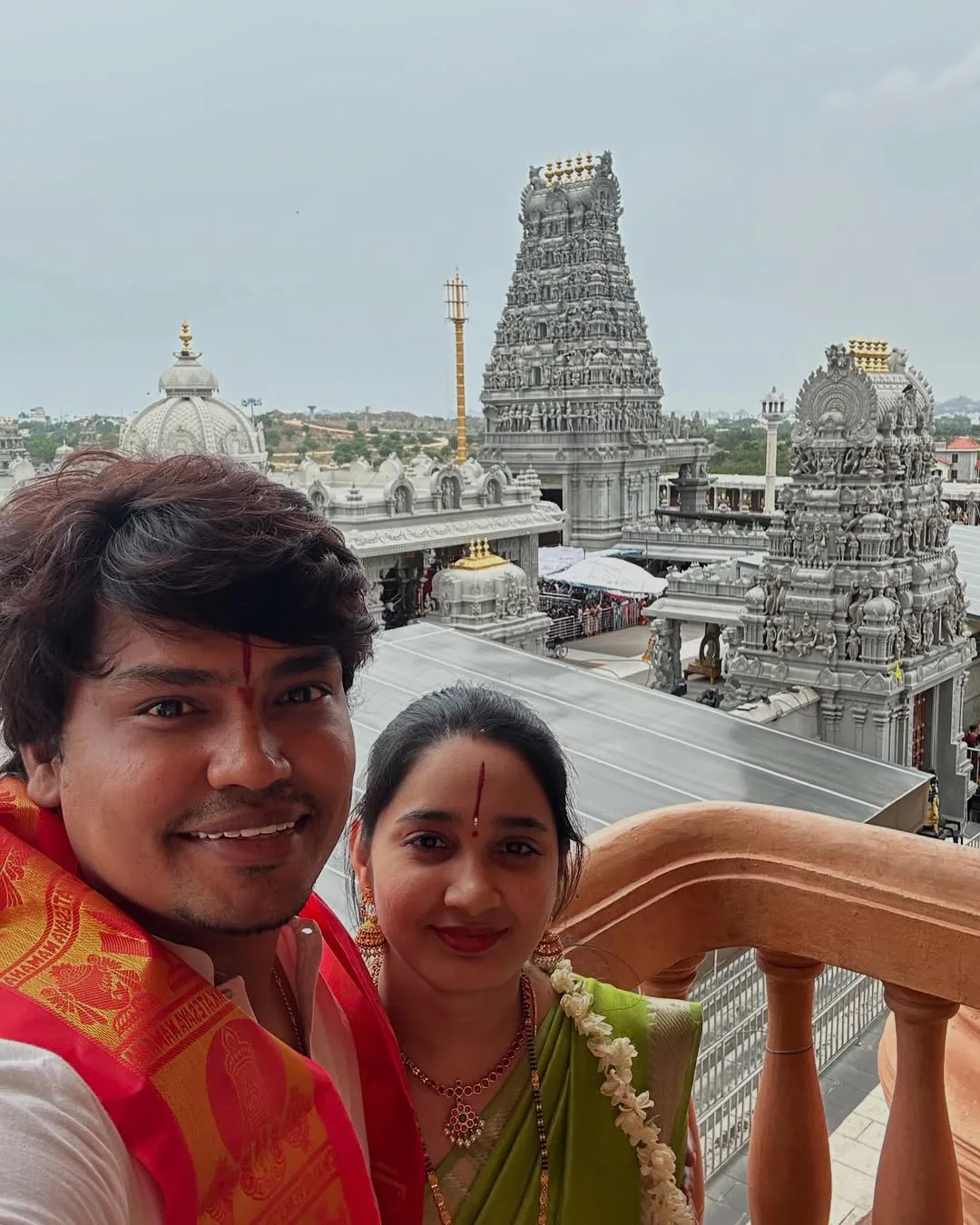 Jabardasth Kevvu Kartheek With Wife Visits Temple