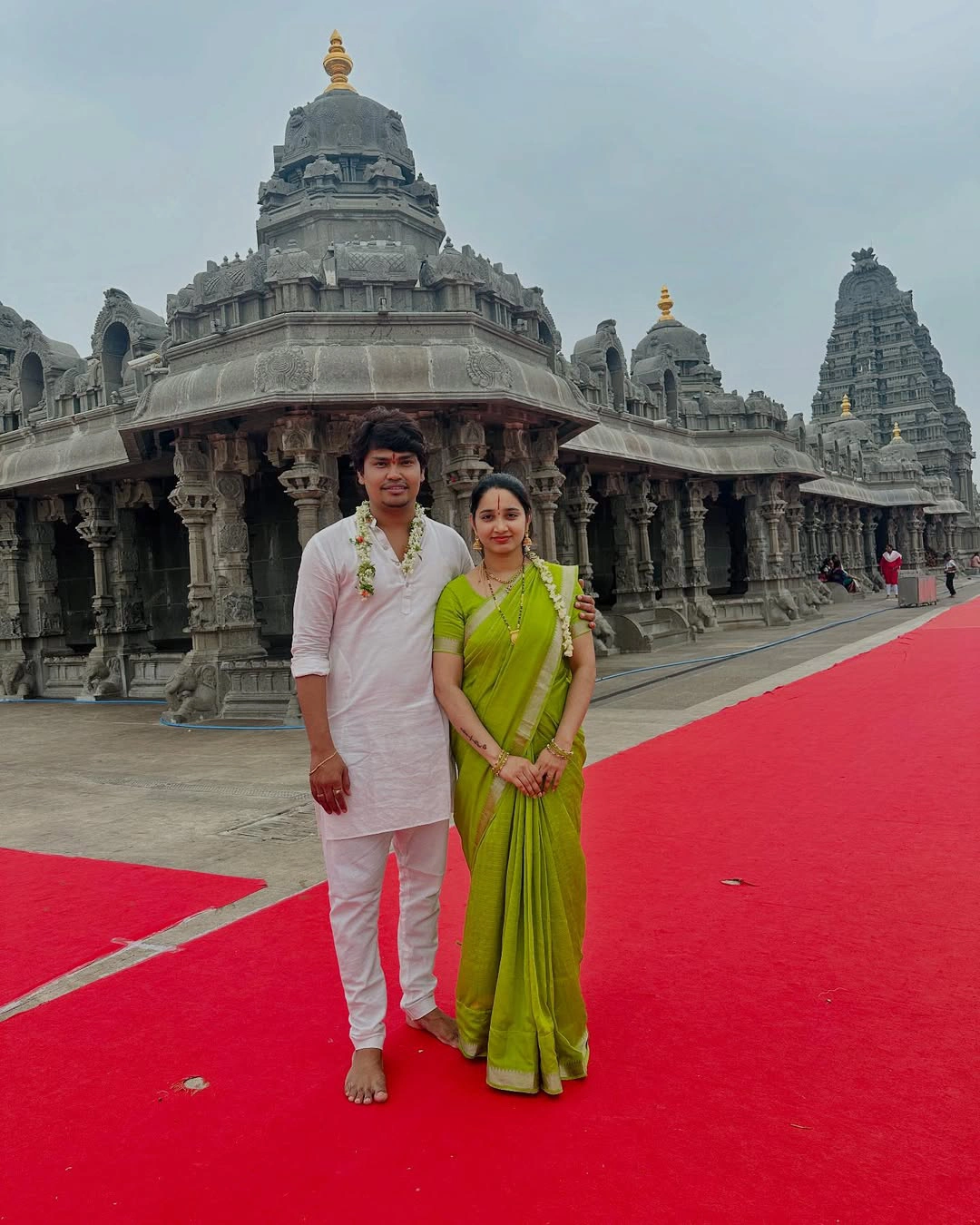 Jabardasth Kevvu Kartheek With Wife Visits Temple