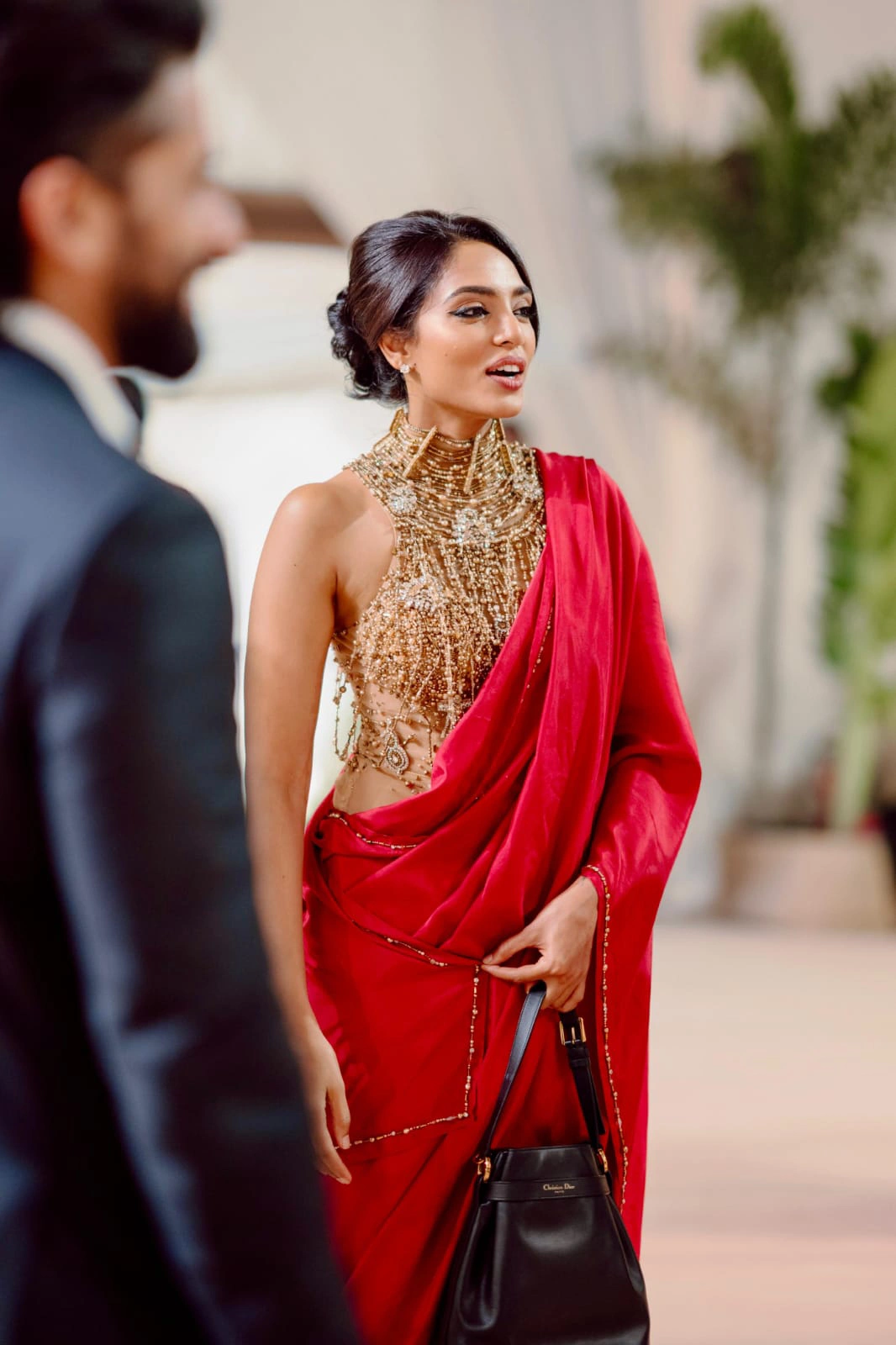 Sobhita Dhulipala Shines in Red Saree at Akkineni Akhil Wedding Reception