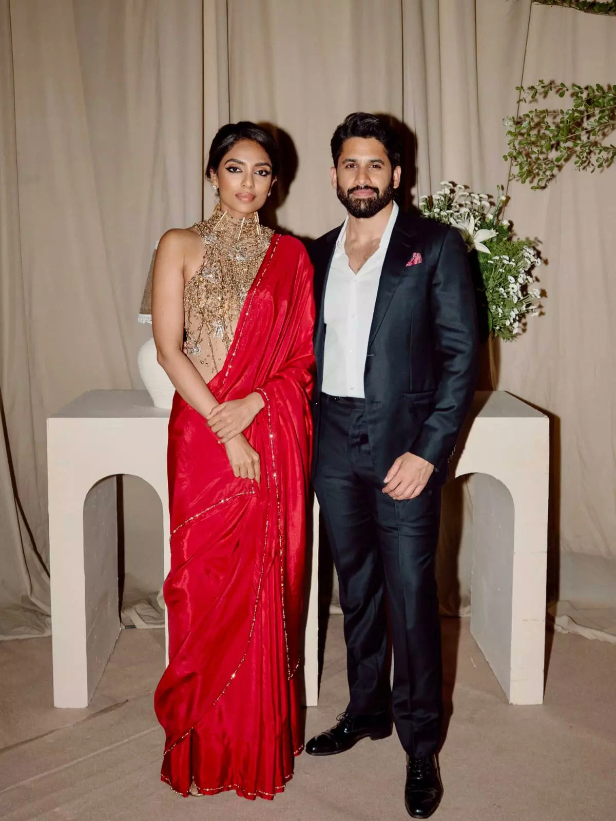 Sobhita Dhulipala Shines in Red Saree at Akkineni Akhil Wedding Reception