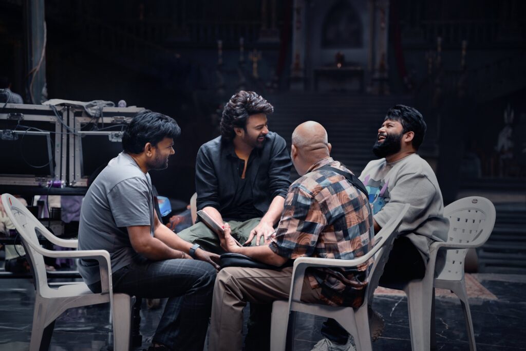 Prabhas The Raja Saab Movie Sets Photo Shares Director Maruthi and Thaman in Photos 