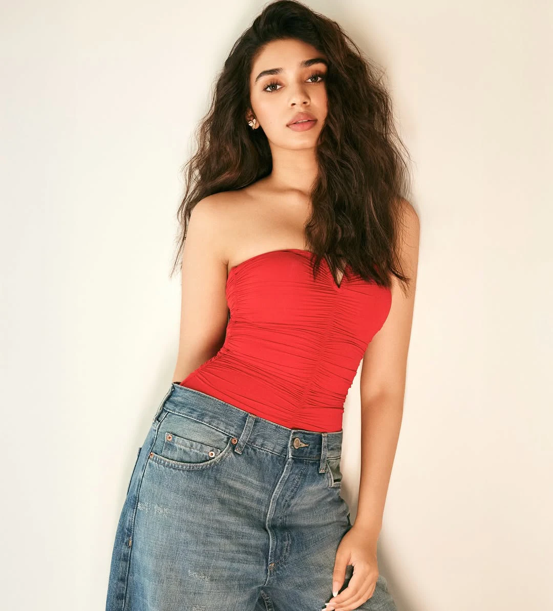 Krithi Shetty Shows her Beauty in Red Top and Blue Jeans