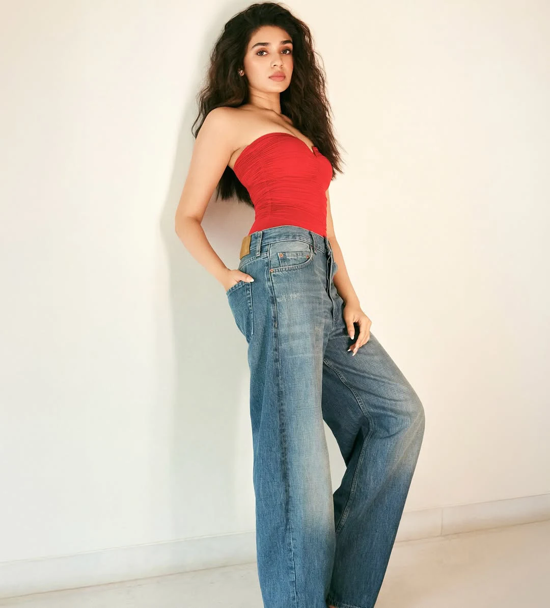Krithi Shetty Shows her Beauty in Red Top and Blue Jeans