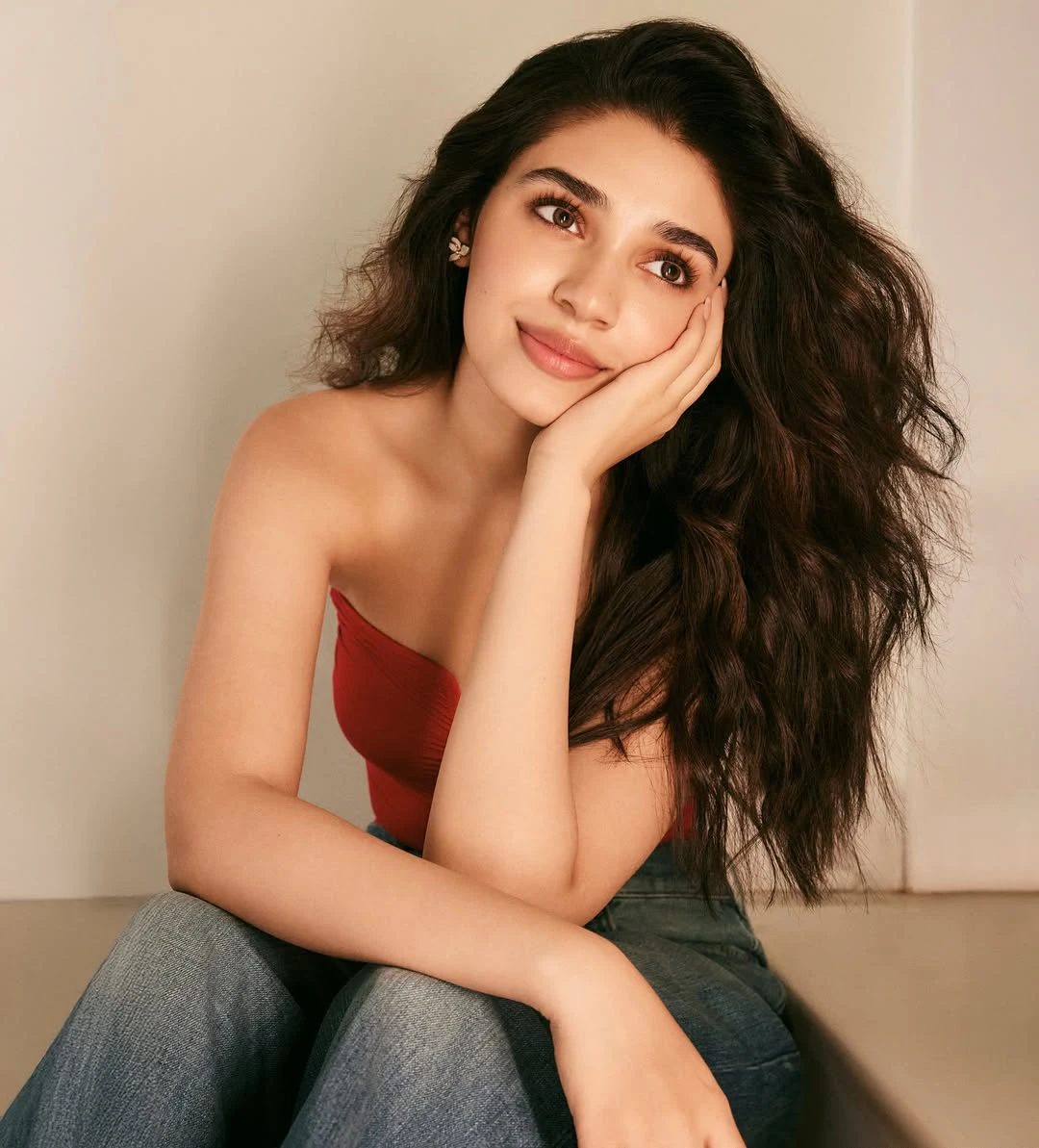 Krithi Shetty Shows her Beauty in Red Top and Blue Jeans
