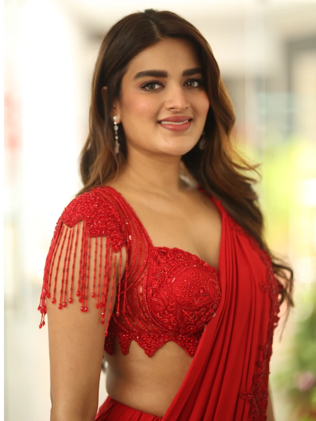 Nidhhi Agerwal Shines in Red Saree