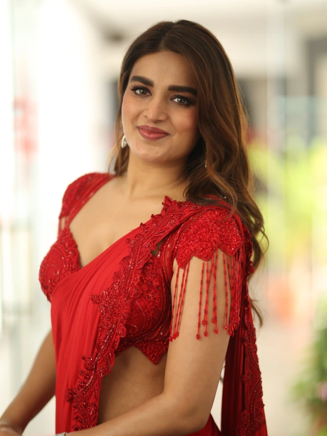 Nidhhi Agerwal Shines in Red Saree