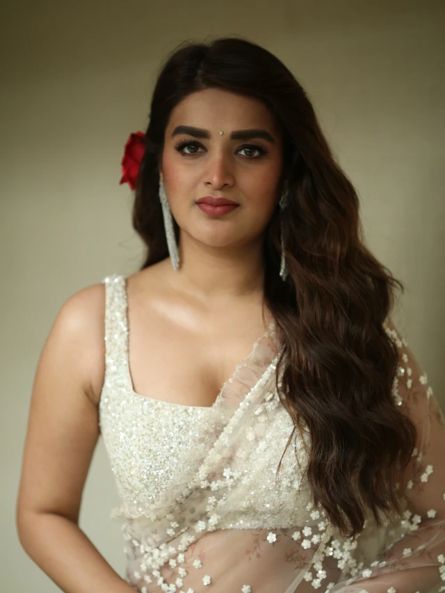 Nidhhi Agerwal Shines in Saree at Hari Hara VeeraMallu Press Meet