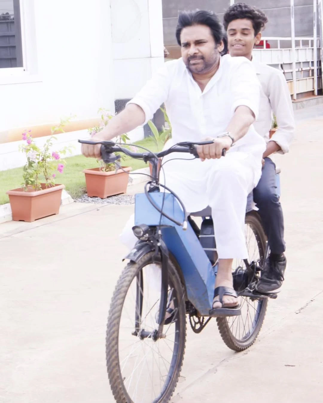 Pawan Kalyan Riding a Battery Cycle