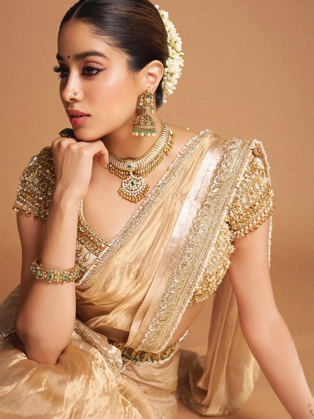 Janhvi Kapoor Shines in Golden Saree
