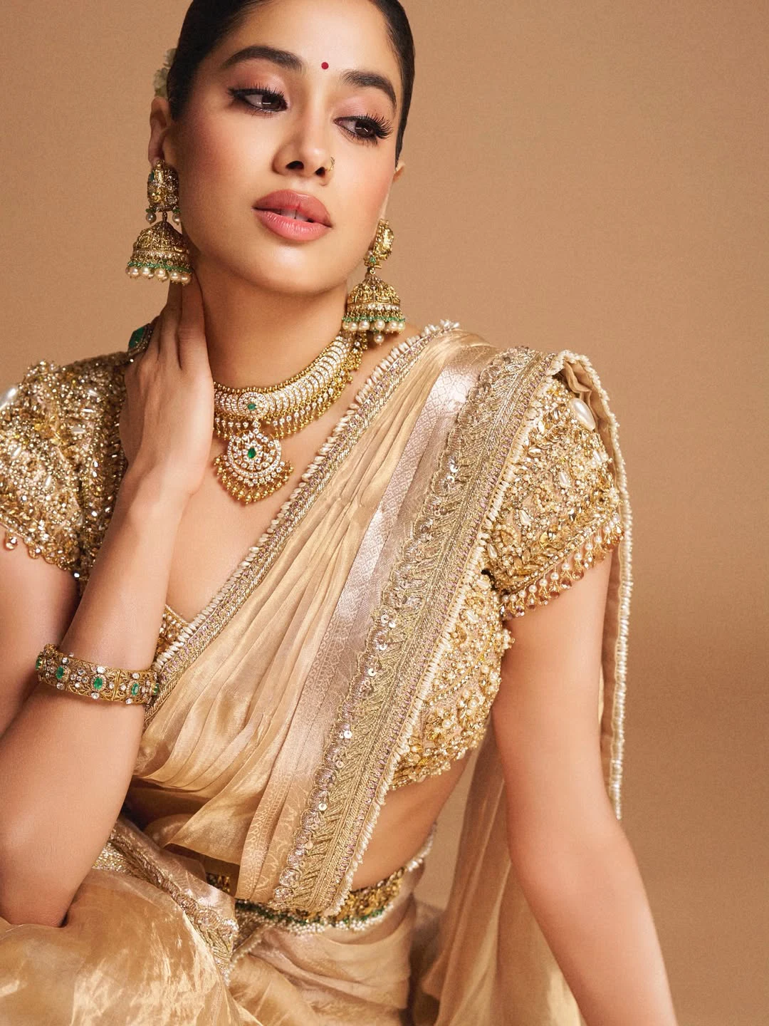 Janhvi Kapoor Shines in Golden Saree