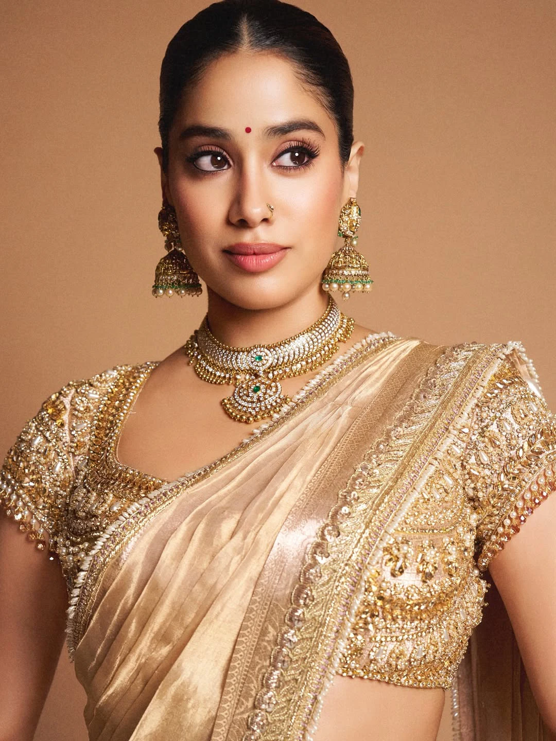 Janhvi Kapoor Shines in Golden Saree