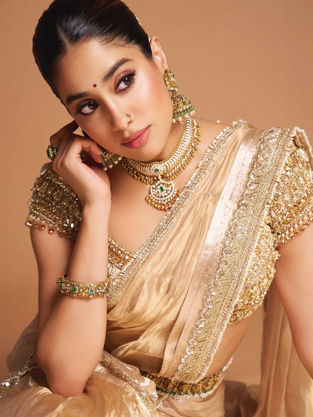 Janhvi Kapoor Shines in Golden Saree