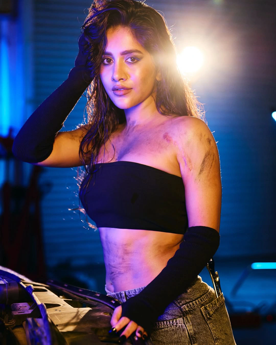 Nabha Natesh Looks like a Beauty Mechanic in Car Shed