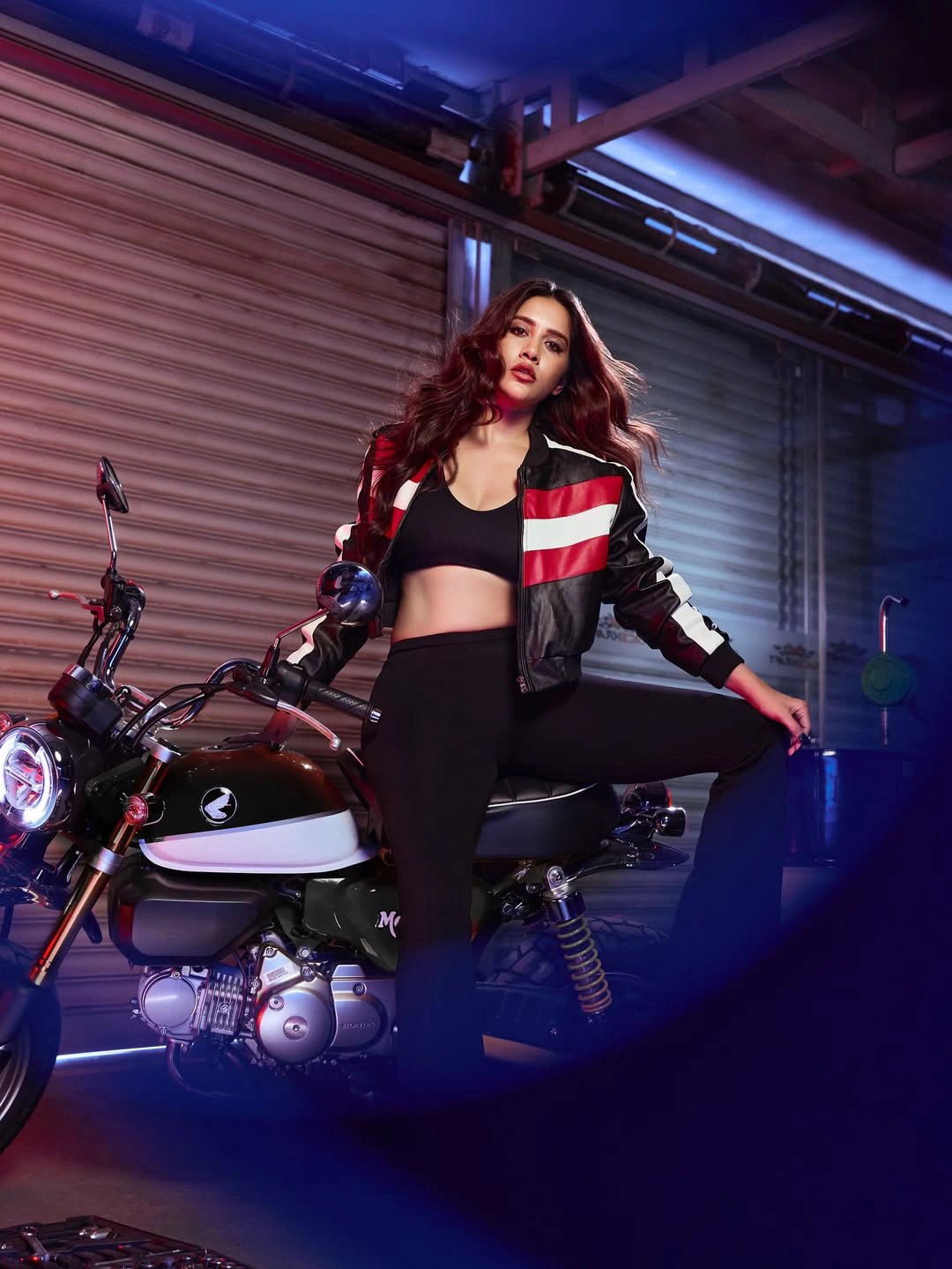 Nabha Natesh Stylish Poses with Bike