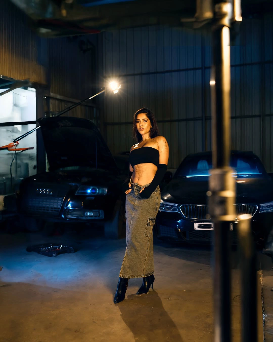 Nabha Natesh Looks like a Beauty Mechanic in Car Shed