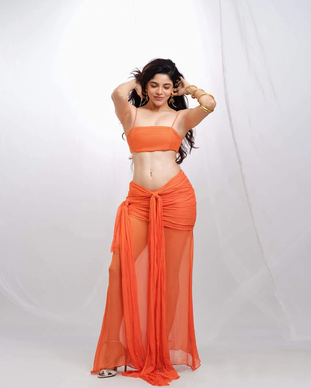 Divyabharathi Stunning Looks in Modern Orange Dress