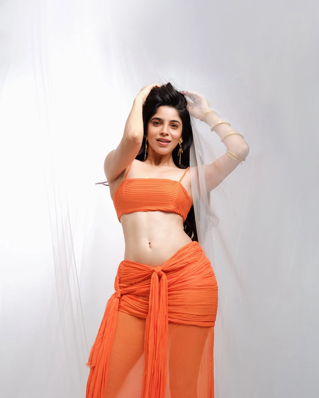 Divyabharathi Stunning Looks in Modern Orange Dress