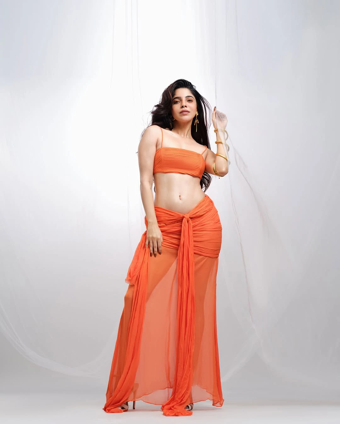 Divyabharathi Stunning Looks in Modern Orange Dress