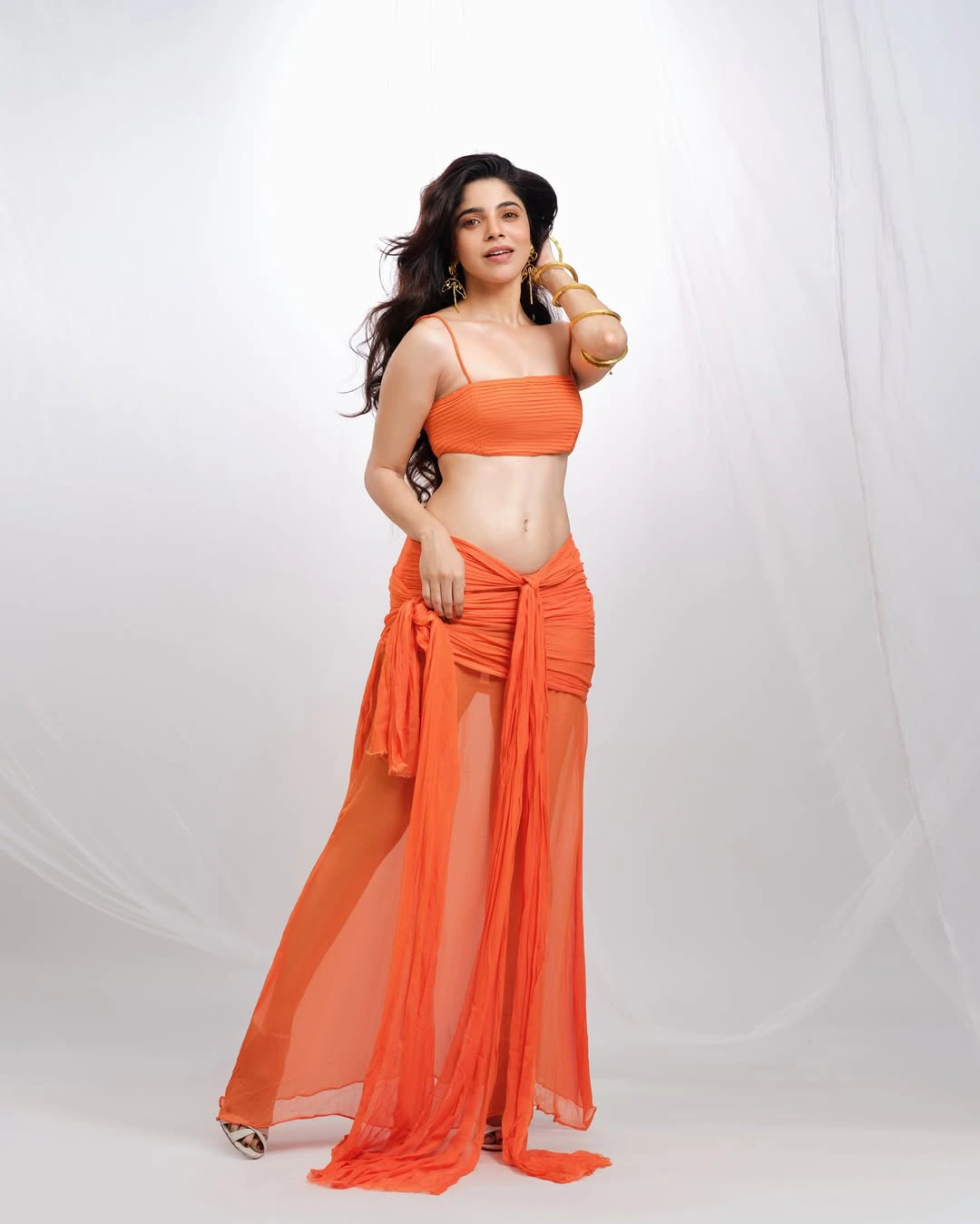 Divyabharathi Stunning Looks in Modern Orange Dress
