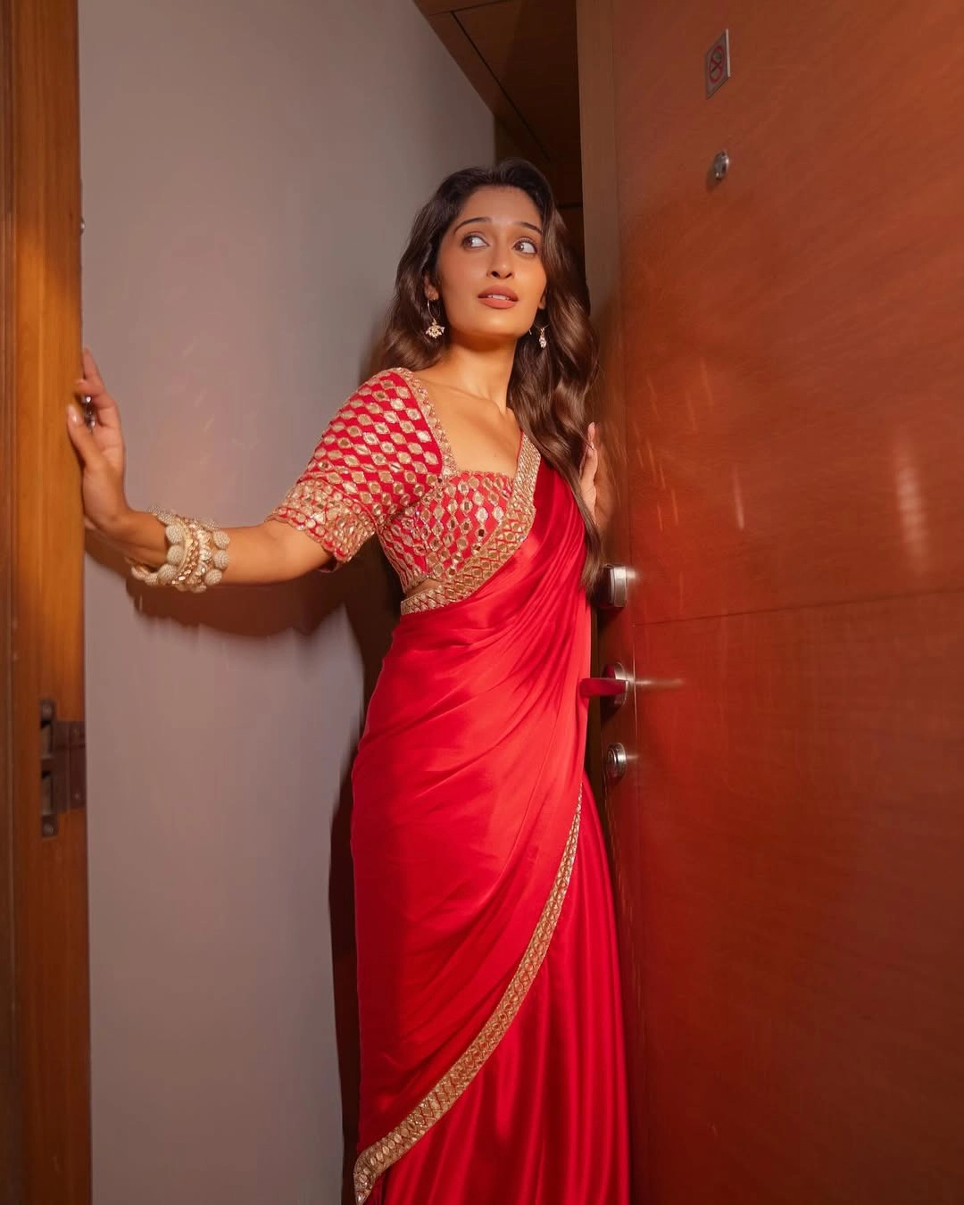 Niharika Nm Shines in Red Saree at Mithra Mandali Movie Promotions